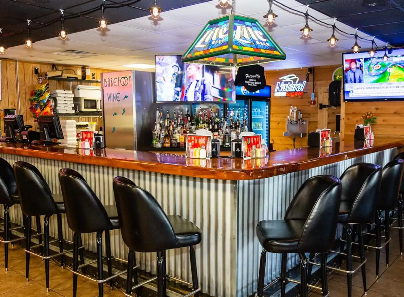 angle shot of the bar at Friendly Bar & Grill Decatur IL