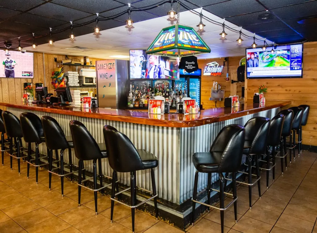 angle shot of the bar at Friendly Bar & Grill Decatur IL